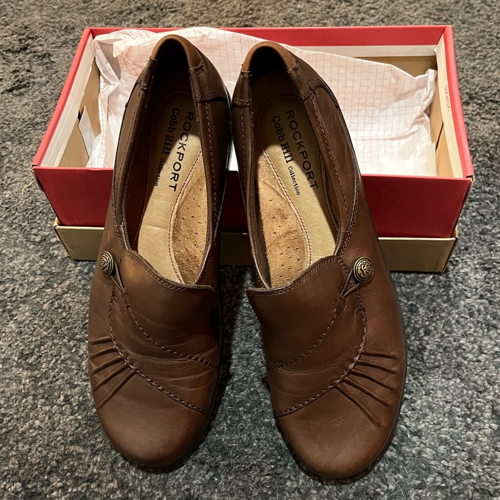 Rockport loafers. Size 8.5M. SO comfortable. Chocolate brown. Gold accent button